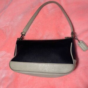 Vintage, Authentic Coach Navy Blue and Cream Leather Purse/ Wristlet. 
NICE!
